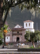 Church of Andahuaylillas, jn front a tree with hanging mats of “spanish moss” (Tillandsia)